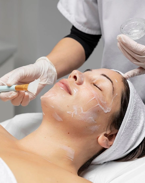 Woman Receiving Facial Treatment at a Medical Spa