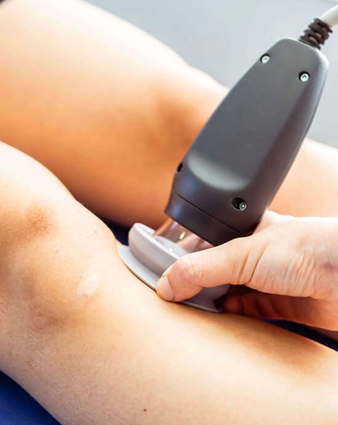 Person Receiving Laser Treatment on Arm in Medical Spa